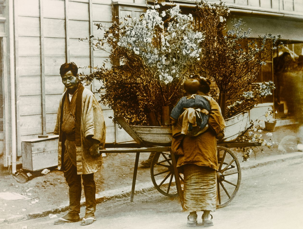 Itinerant Flower Seller in the Streets of Tokyo, circa 1900 - 1915 by Teijiro Takagi