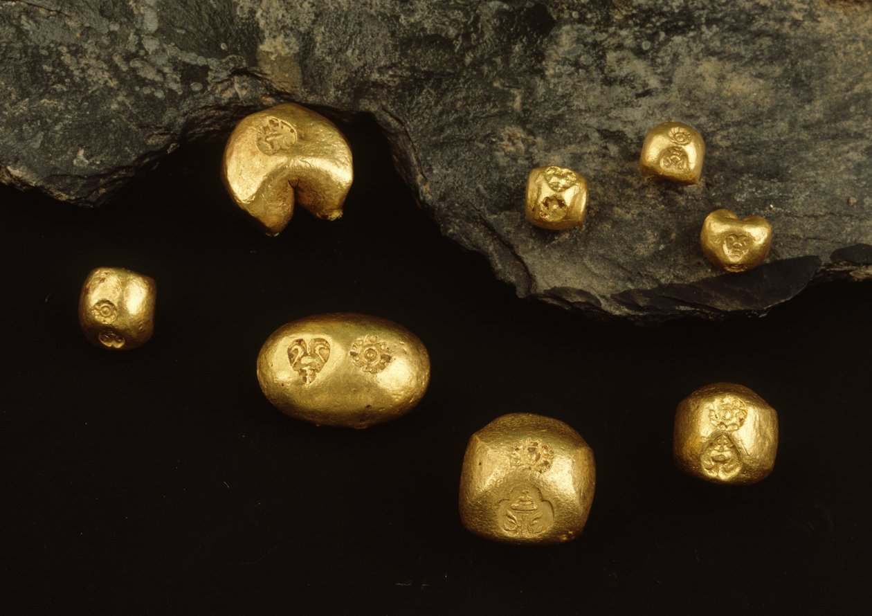 Twenty-two carat bullet coins from the reign of King Rama IV by Thai School