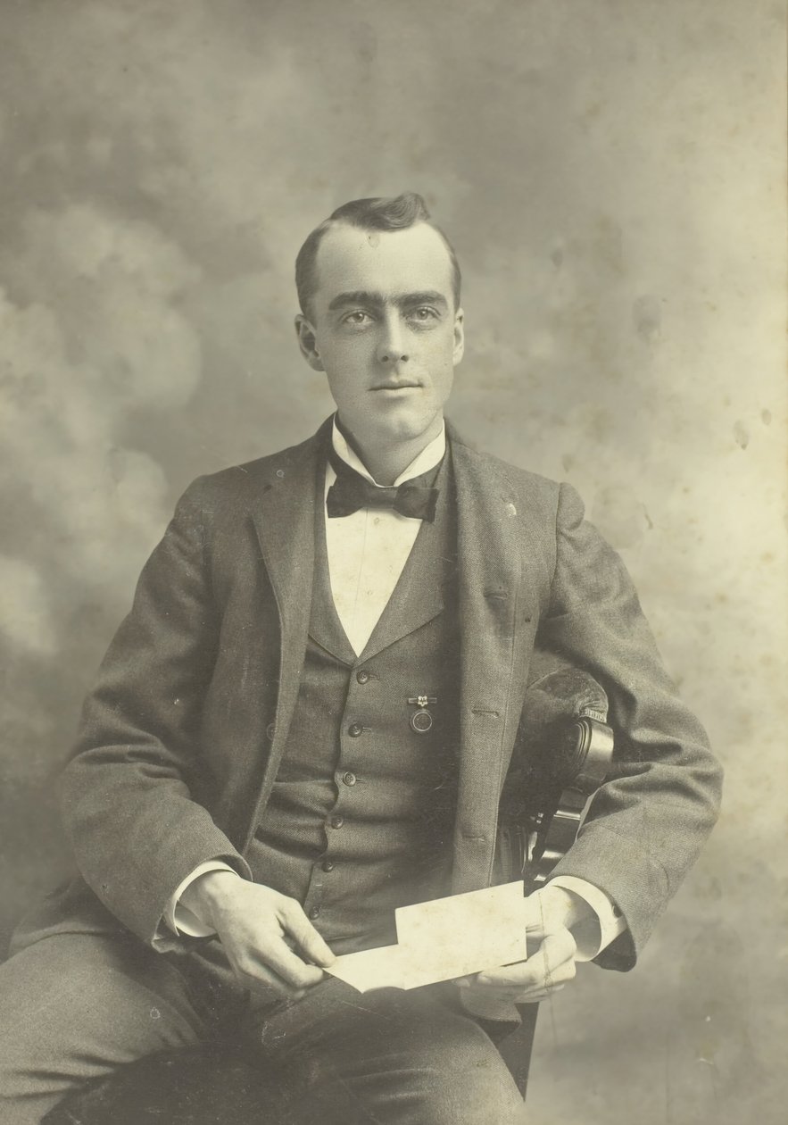 Untitled Portrait of Seated Man by Thompson Studio