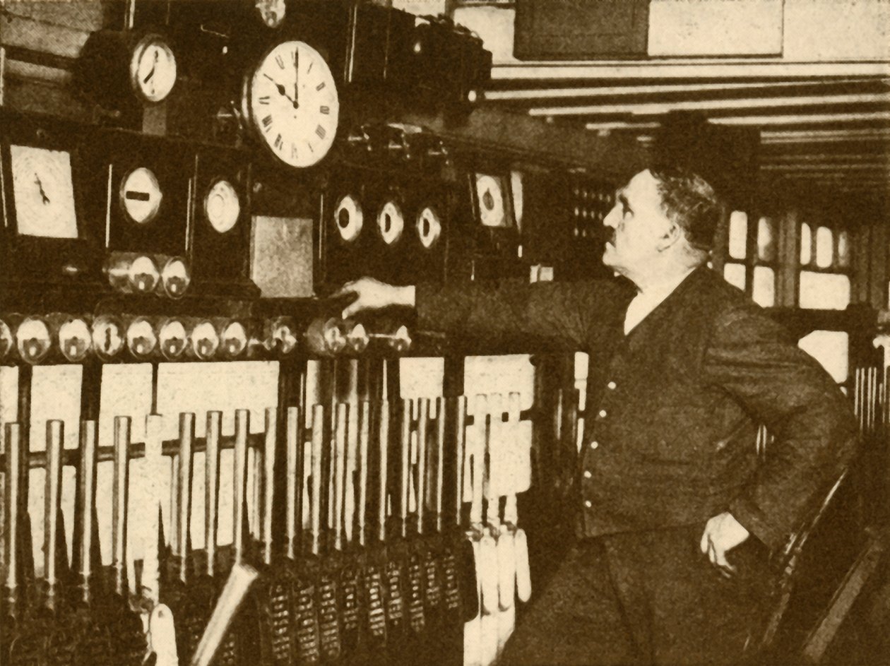 Recording Daily Time Signal at Liverpool Street Station, London and North Eastern Railway, 1930 by Topical Press Agency