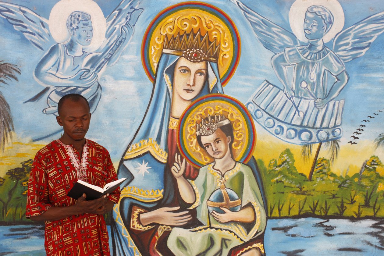 African Man Reading the Bible, Togoville, Togo by Unbekannt