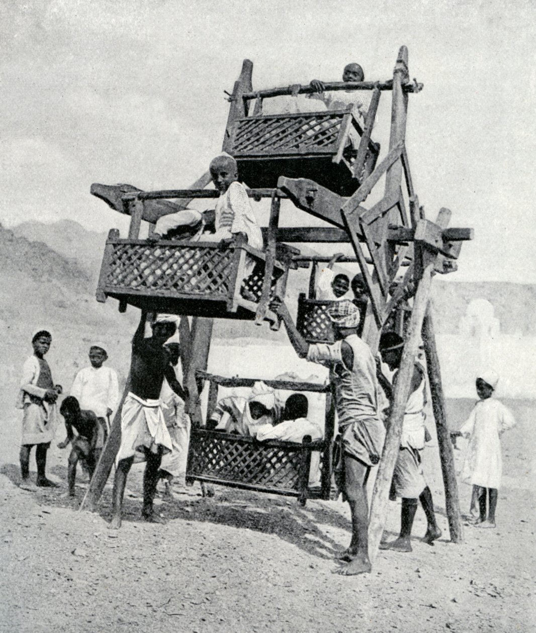 Arabian Children Enjoying a Big-Wheel by Unbekannt