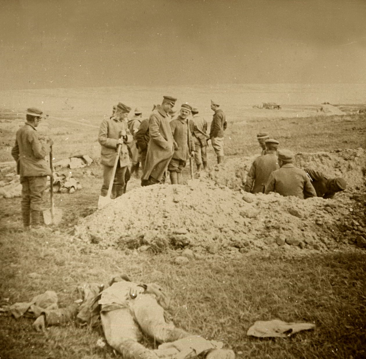 Burying Bodies, Sainte-Marie-à-Py, Northern France by Unbekannt