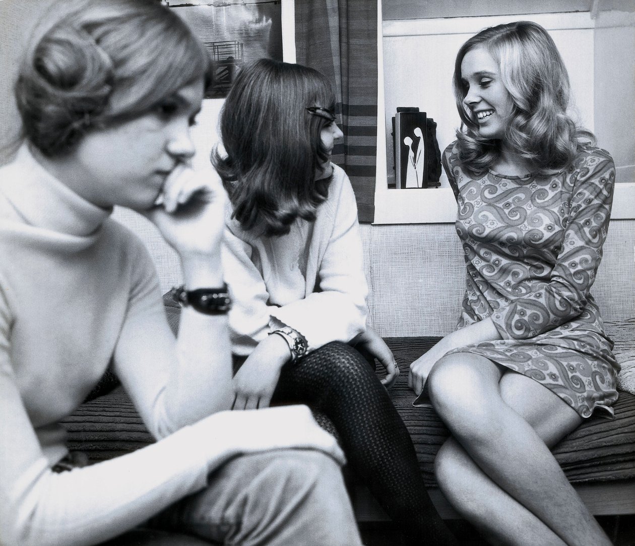Fashion: Young Girls at a Party in Spain, One of the Women is Wearing a Very Short Dress by Unbekannt
