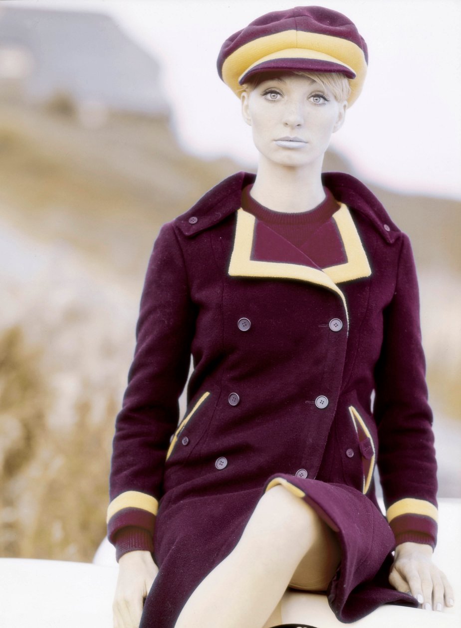 Fashion: young woman wearing a cap and a coat, late 1960s-early 1970s by Unbekannt