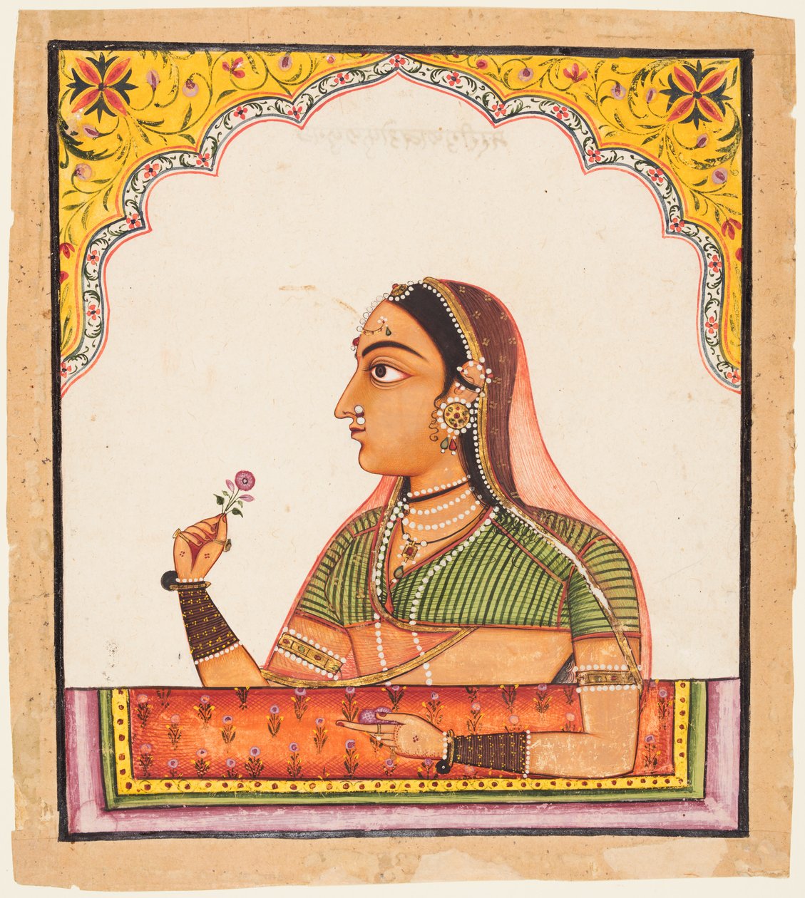 From a series of female portraits: A lady at a jharoka window holding a rose by Unbekannt