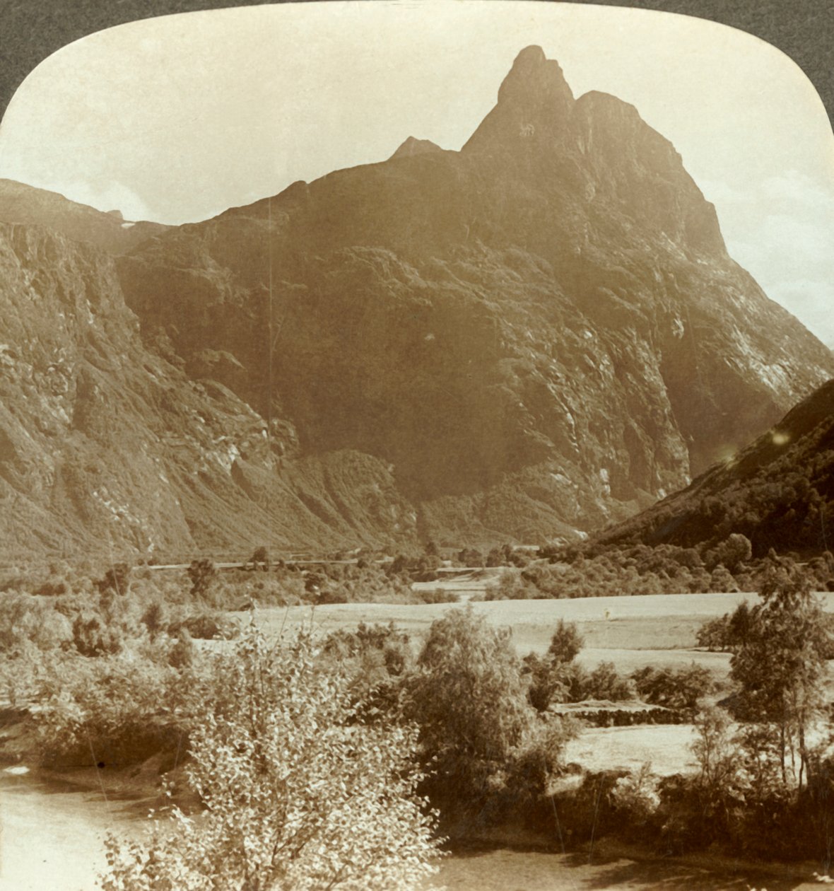 Sharp Pinnacles of Romdalshorn Crowning Mountain Wall Above Rauma River, Norway, c1905 by Unbekannt