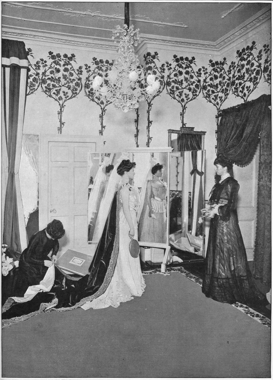 The finishing touches of a dressmaker, London by Unbekannt