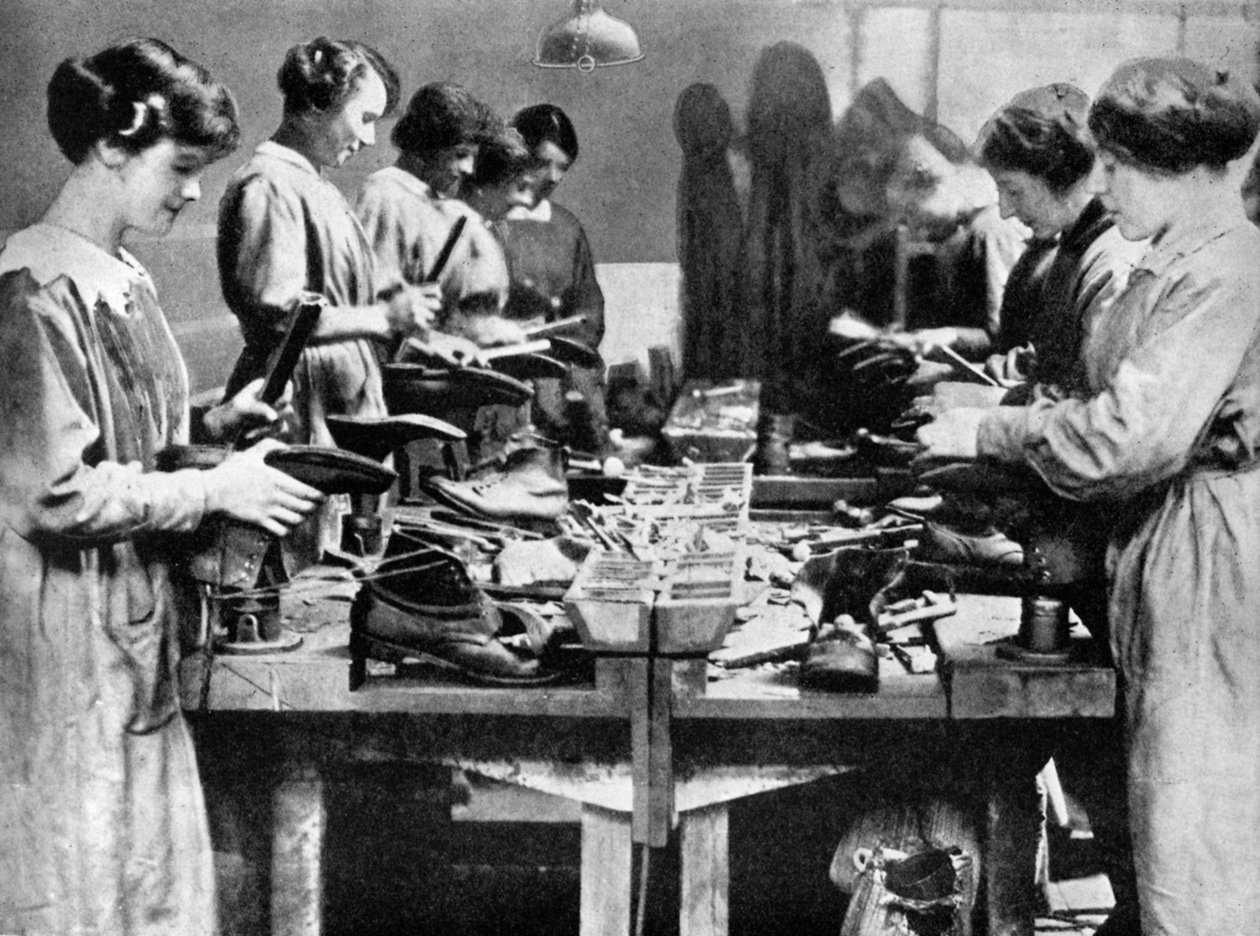 Women cobblers repairing footwear for the war effort by Unbekannt
