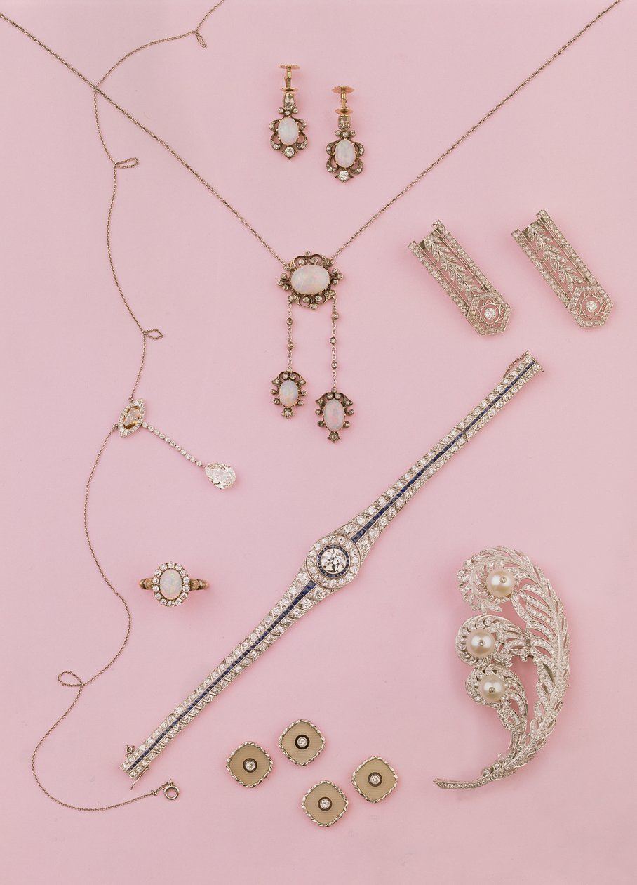 Selection of Edwardian and Art Deco jewellery: opal earrings and pendant; diamond neglige pendant; ostrich plume brooch; diamond and onyx cufflinks and studs by Unbekannt Unbekannt