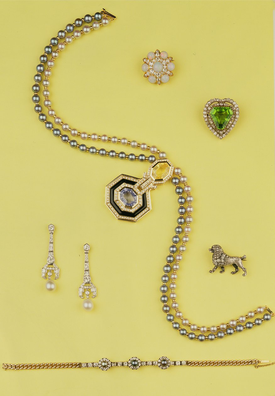 Selection of jewellery: Art Deco style cultured pearl necklace with yellow and blue sapphires; diamond and pearl pendant earrings; opal and rose diamond cluster star brooch; rose diamond poodle brooch by Unbekannt Unbekannt
