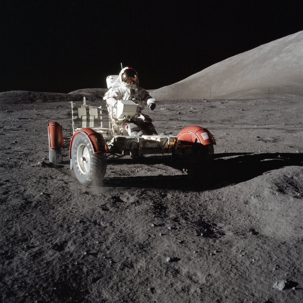 Astronaut Eugene Cernan drives the Lunar Roving Vehicle during first EVA by Unbekannt