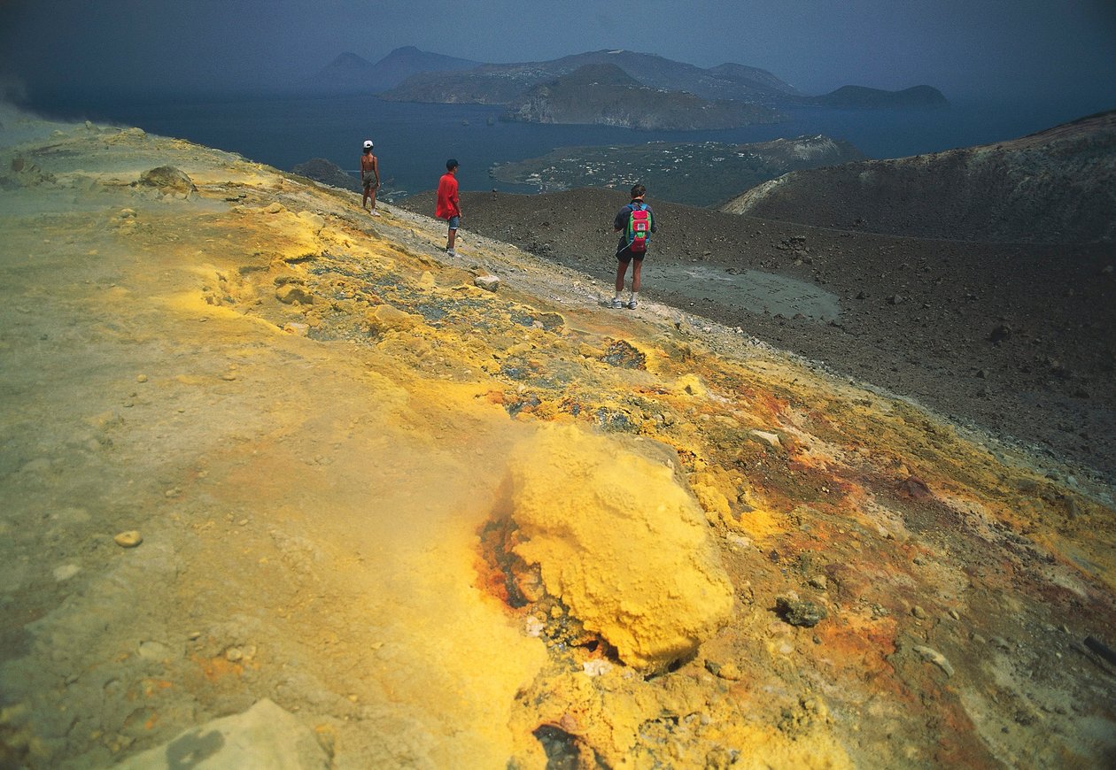 Italy, Sicily, Aeolian Islands, Messina, Vulcano Island, Sulfurous fumaroles and Lipari Island in background by Benjamin Baud