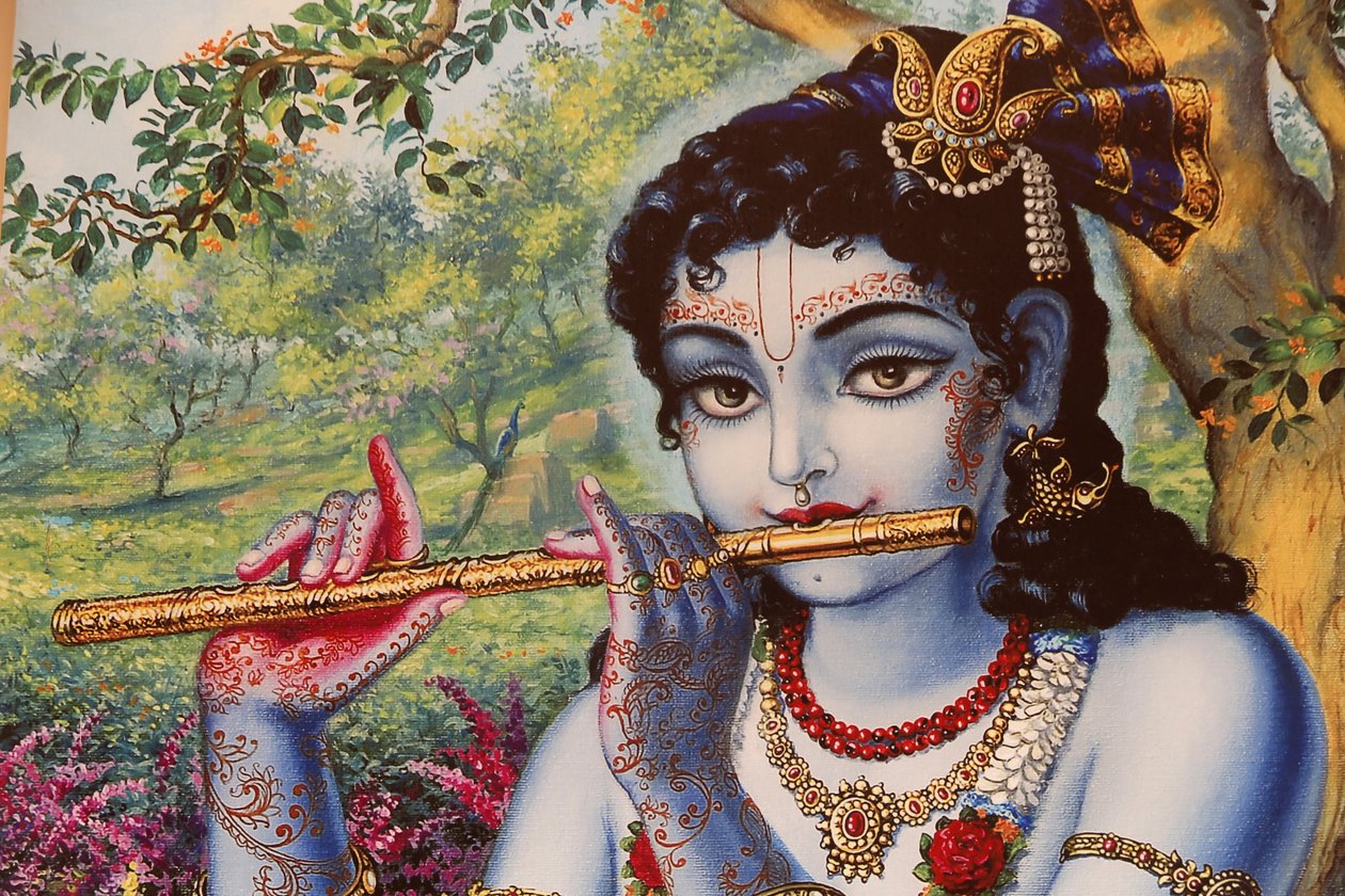 Painting depicting Hindu god Krishna playing a flute outdoors, India by Unbekannt