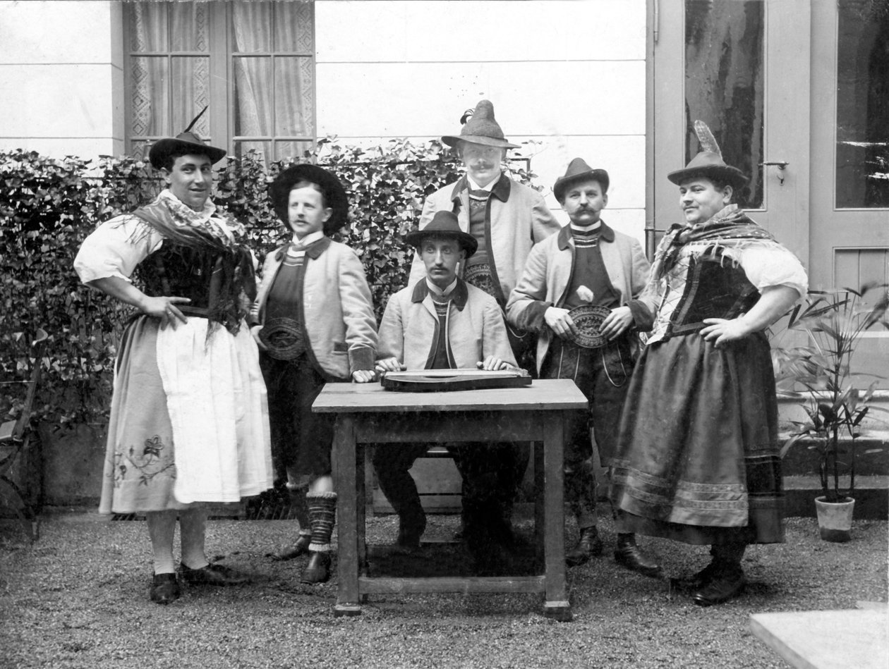 Portrait of a group of men wearing traditional Bavarian costumes, some disguised as women (1910) by Unbekannter Künstler