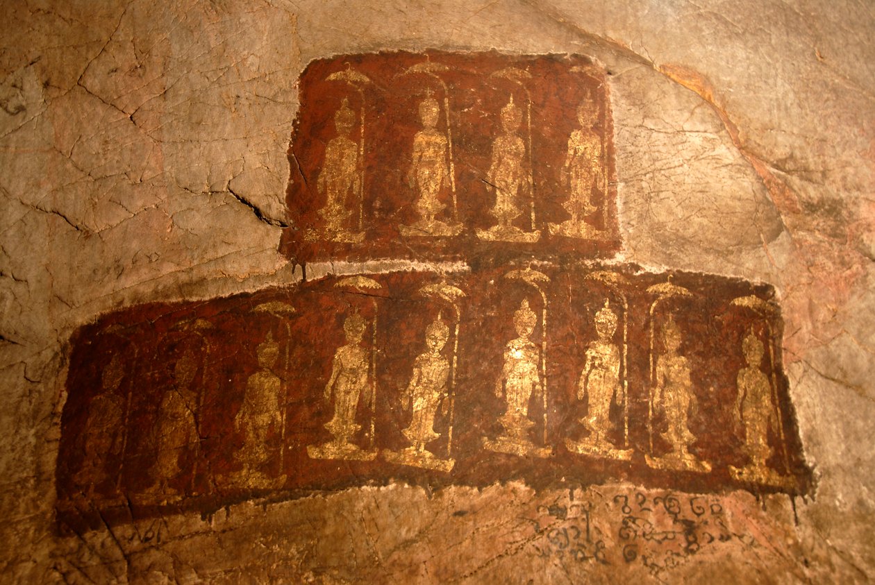 Theravada Buddhism; ancient wall painting; standing Buddha Shakyamuni; Mudra; Varada; gesture of wish-granting; Tham Pa cave; at Nong Thang; Xieng Khouang province; Laos; Southeast Asia; Asia by Unbekannter Künstler