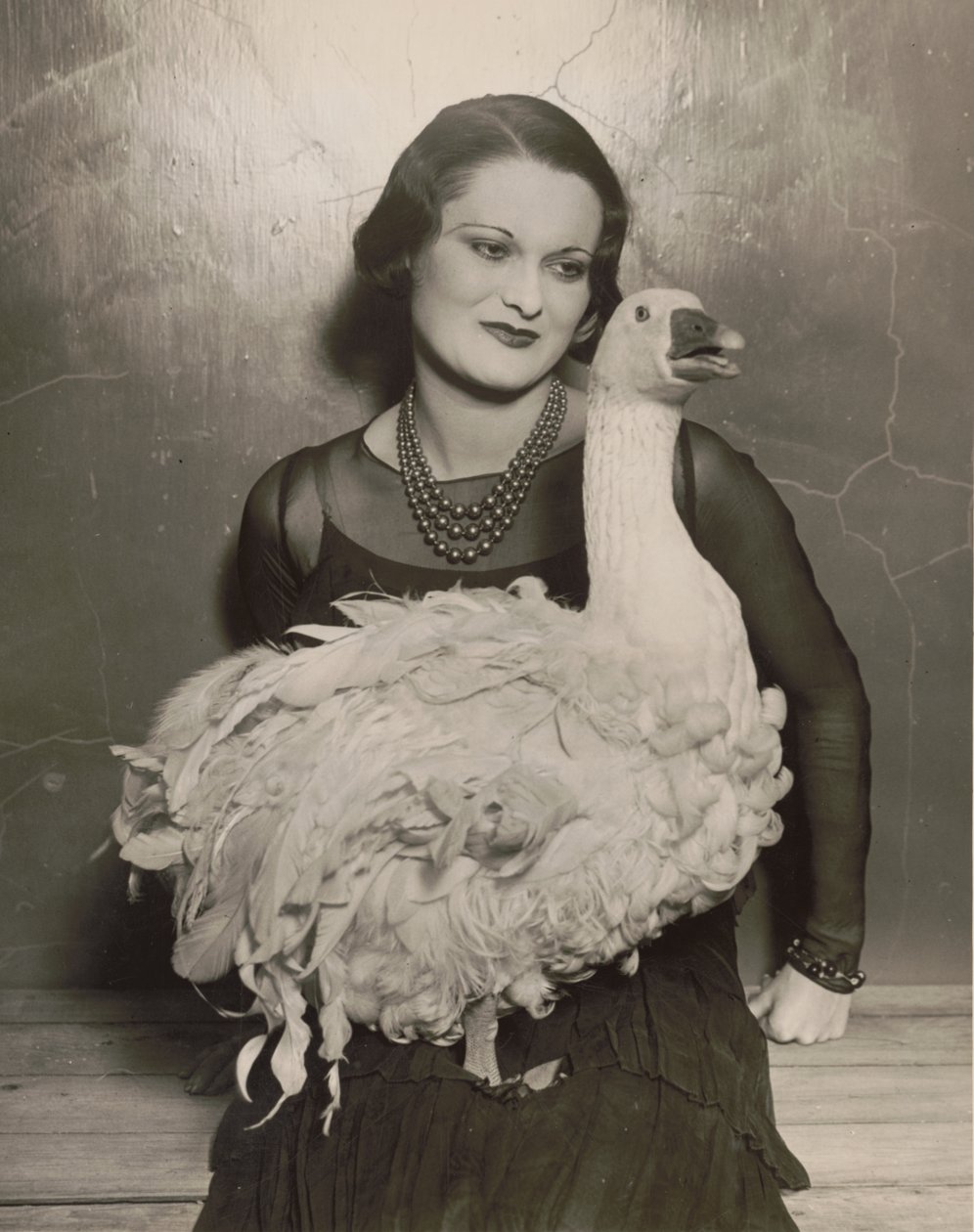 British actress Isla Bevan holding an exotic goose by Underwood and Underwood