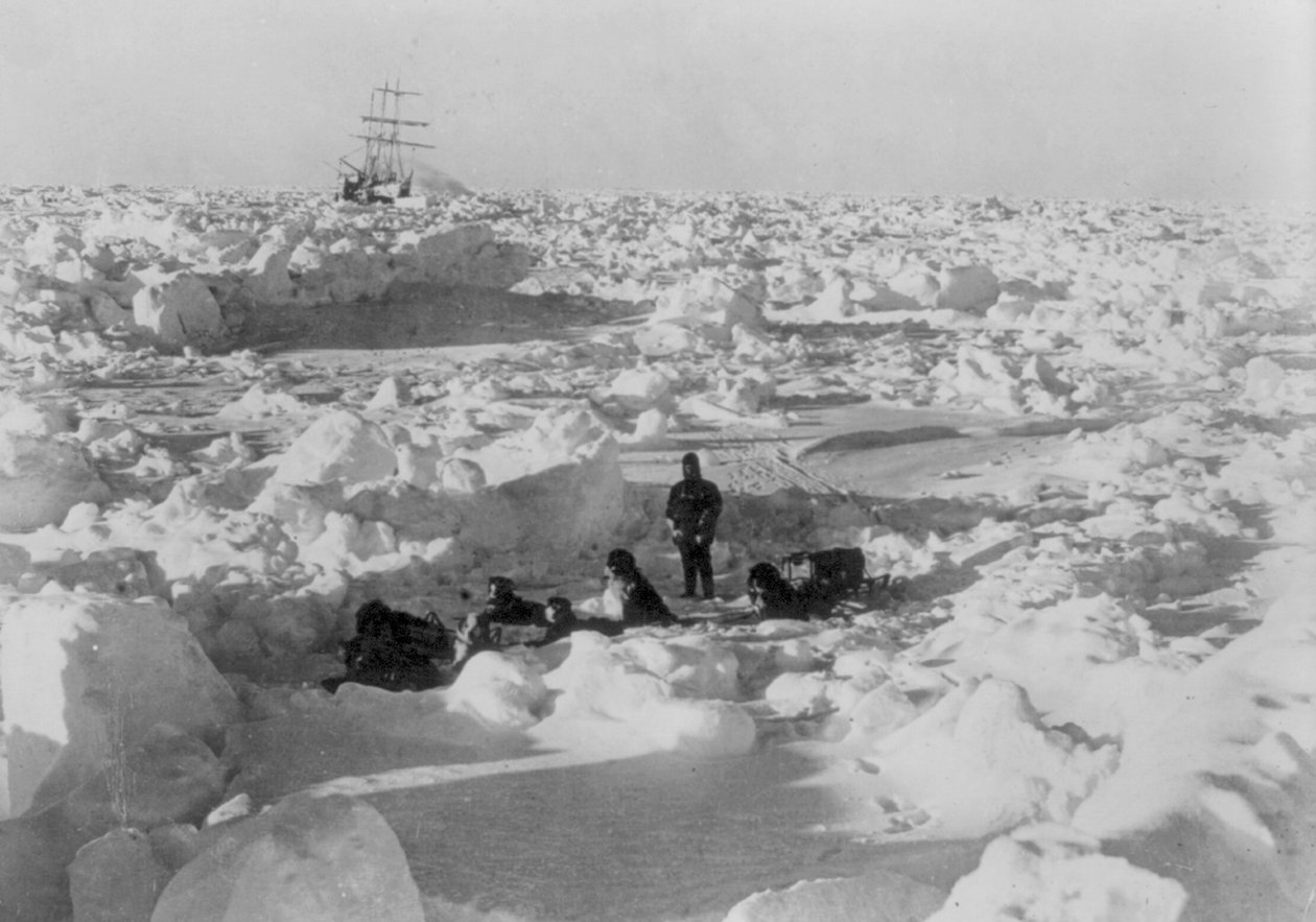 Imperial Trans-Antarctic Expedition: crew member hitched together sitting among ice floe, c.1914-17 by Underwood & Underwood