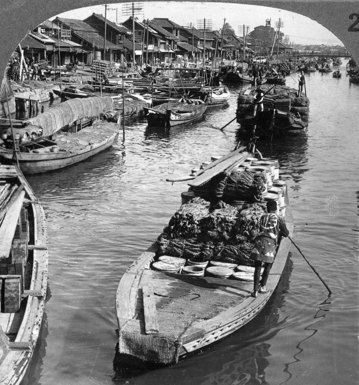 A Busy Freight Canal in Tokyo, Japan by Underwood and Underwood