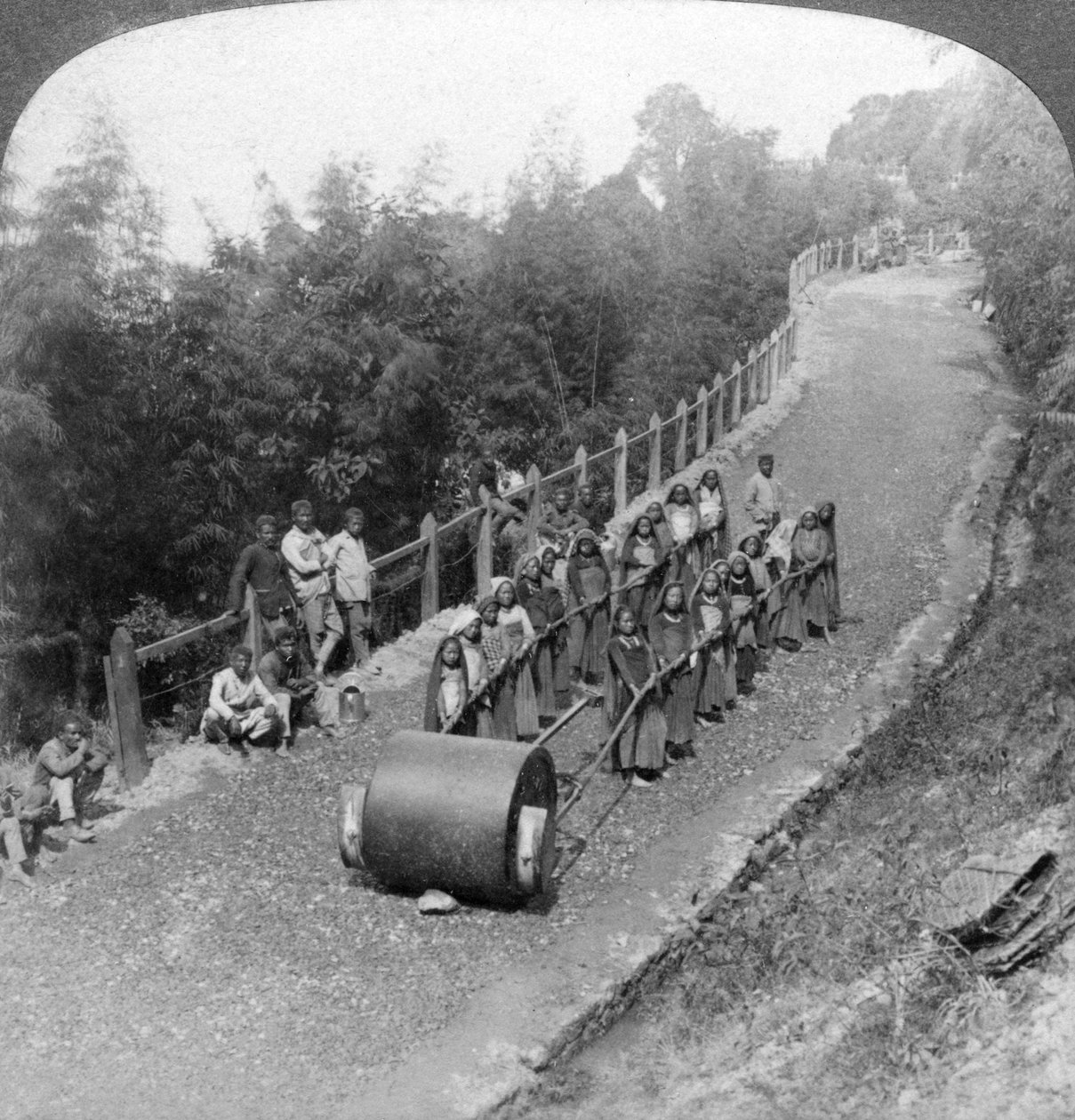 A woman work team on the Darjeeling highway, India, 1903 by Underwood and Underwood