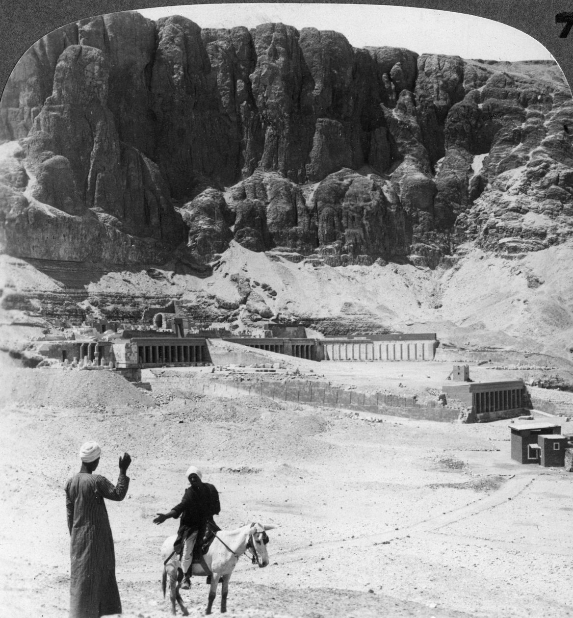 Buried for ages - colonnaded terraces of the temple at Der-el-Bahri, Thebes, Egypt by Underwood and Underwood