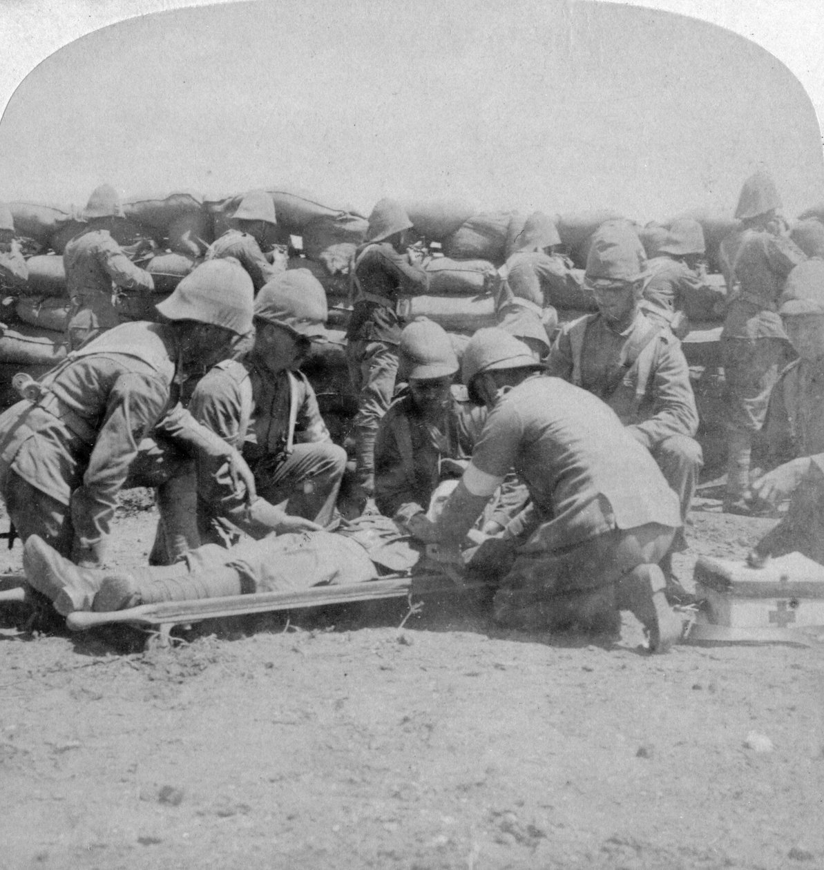 First Aid to a Wounded Fusilier, Honey Nest Kloof Battle, Boer War, South Africa by Underwood and Underwood