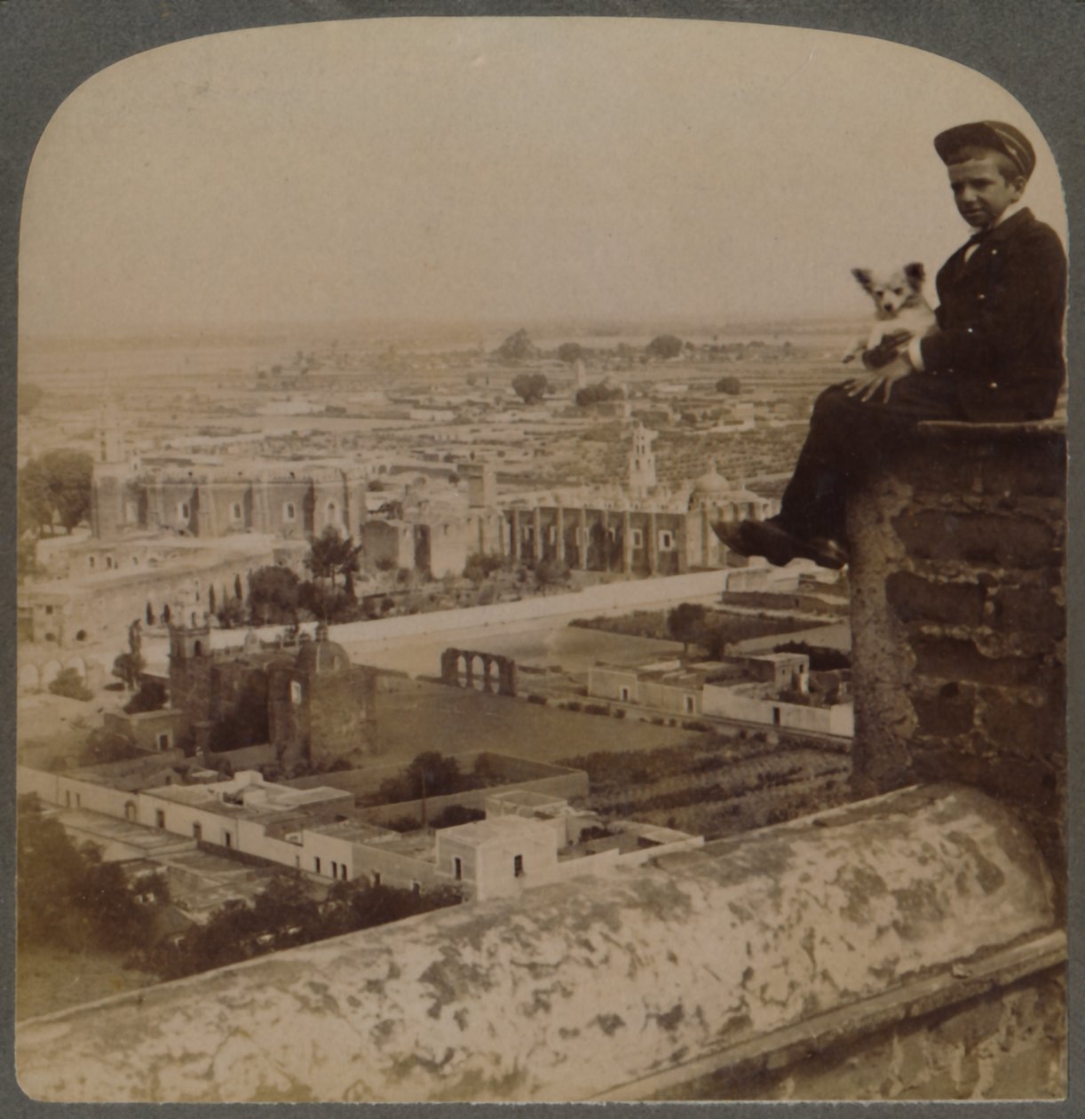 From San Francisco Cathedral, on the largest Aztec Pyramid, looking over Cholula, Mexico by Underwood and Underwood