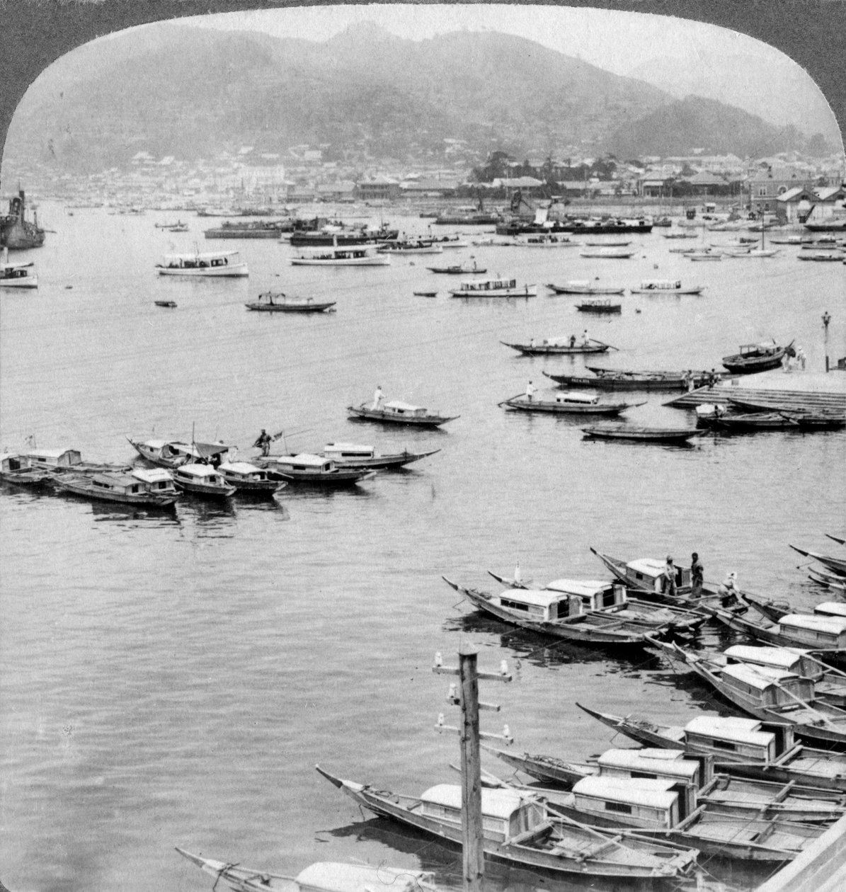 Looking north over vessels in the port of Nagasaki, Japan by Underwood and Underwood