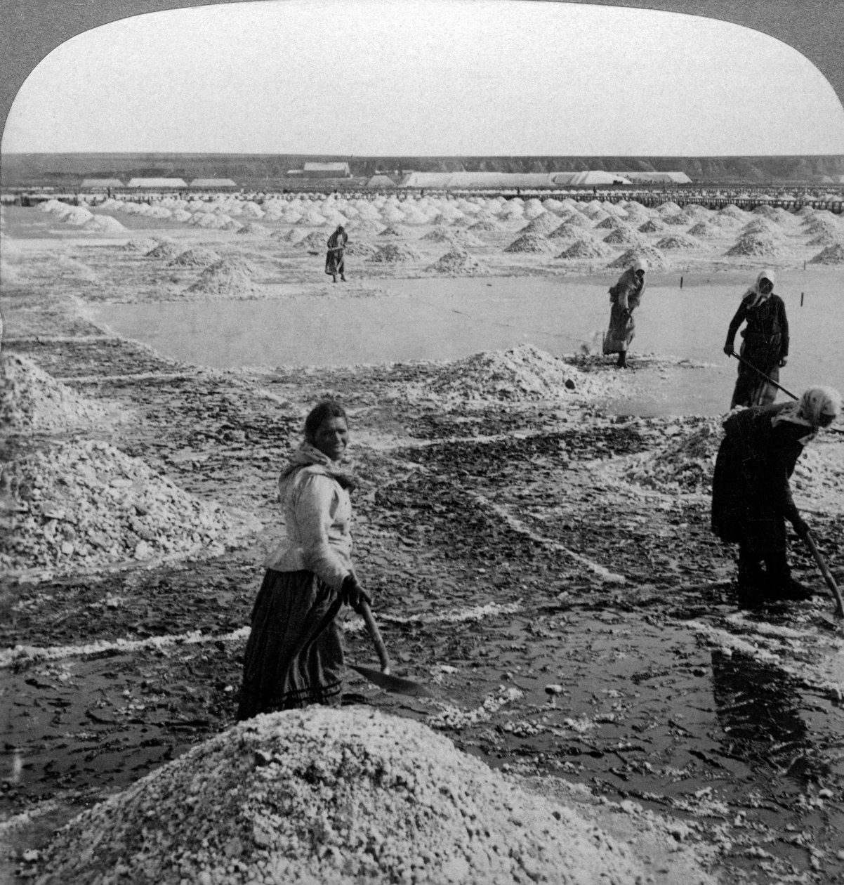Reservoir After Evaporation, Turning Up the Salt Fields, Solinen, Russia by Underwood and Underwood