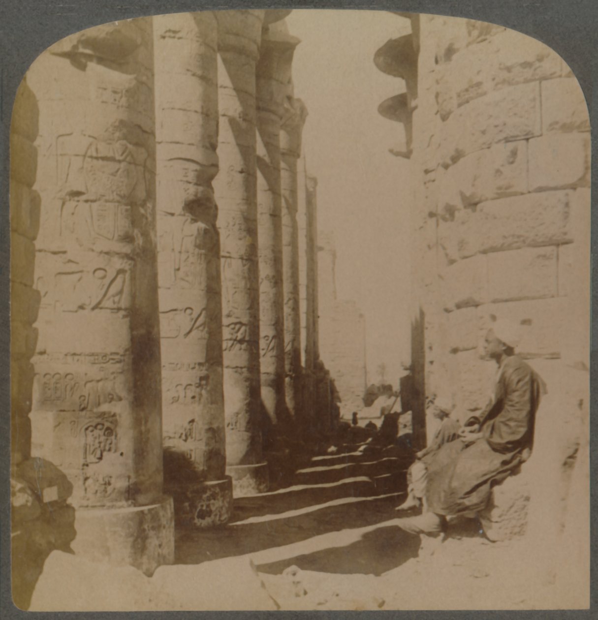 The famous colonnade of the great Hypostyle Hall in the Temple of Karnak, Thebes, Egypt, 1897 by Underwood and Underwood