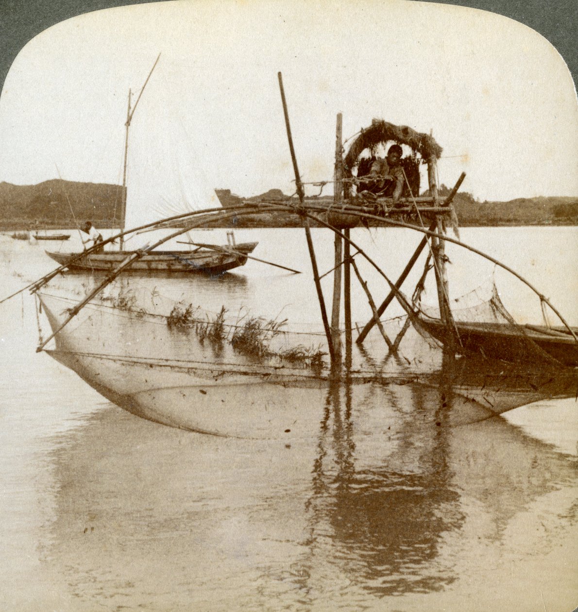 Toiler of the Sea, with His Curious Fishing Net, Bay of Matsushima, Japan by Underwood and Underwood