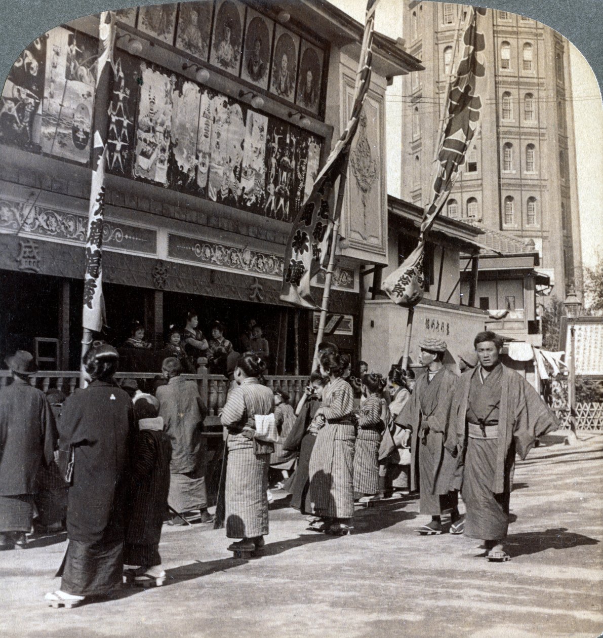 Watching a Free Show on Theatre Street, Looking North to Asakusa Tower, Tokyo, Japan, 1904 by Underwood and Underwood
