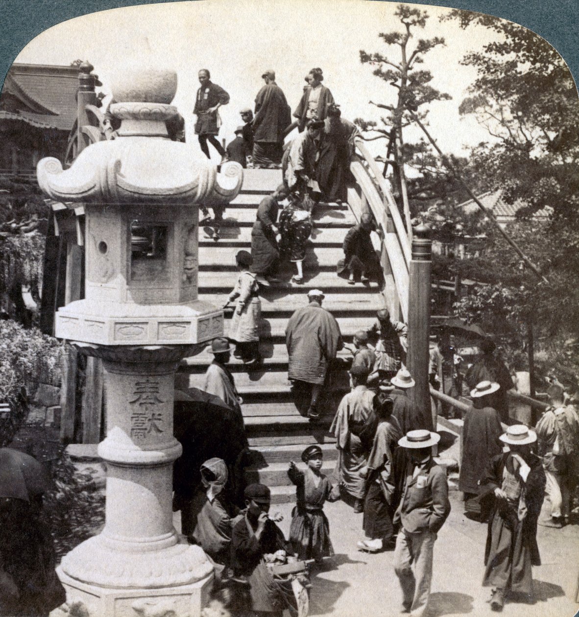 Worshippers Crossing the Semi-Circular Bridge to Kameido Temple Beyond, Looking North, Tokyo, Japan by Underwood and Underwood