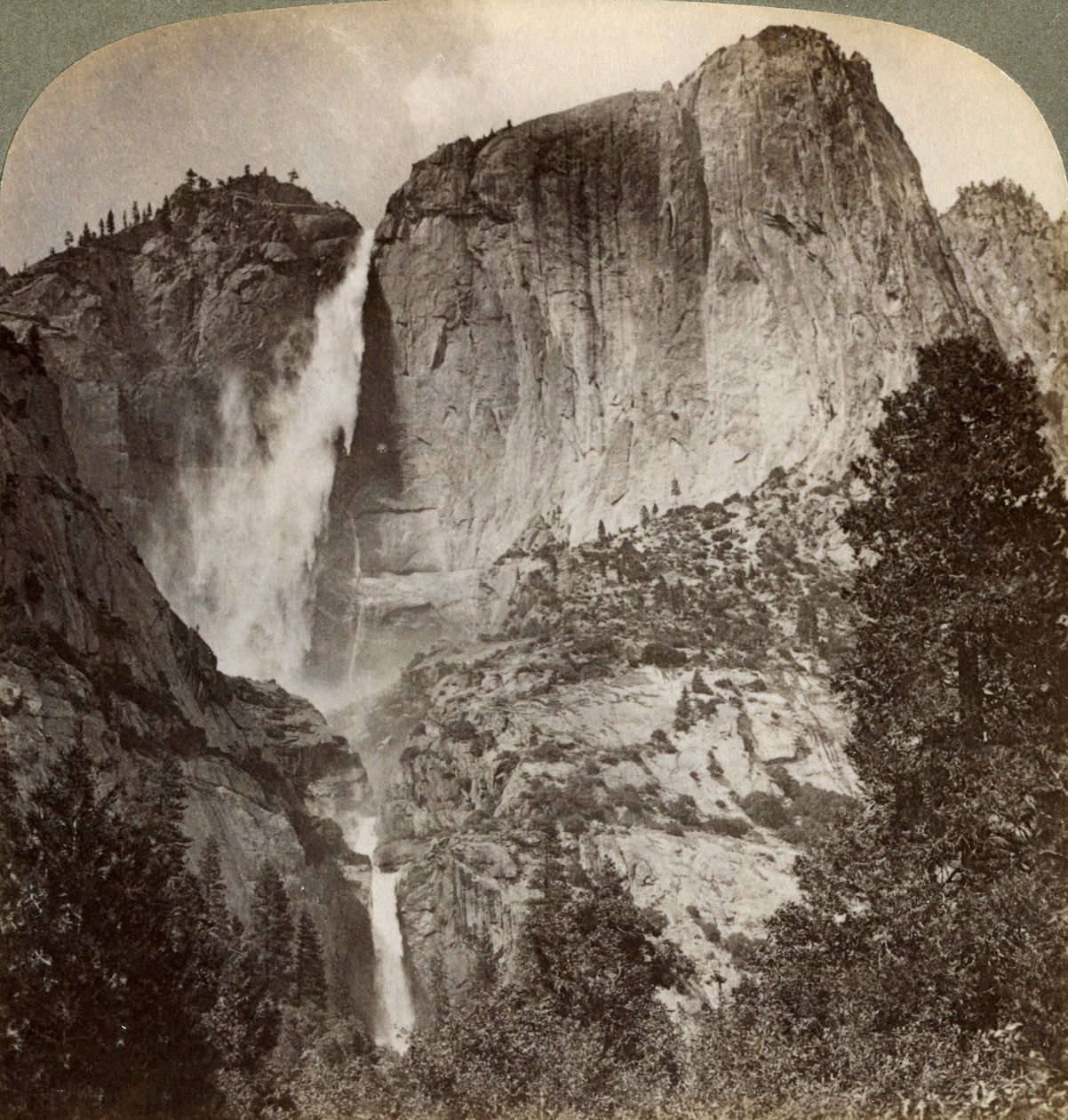 Yosemite Point and Wind-Blown Yosemite Falls, Yosemite Valley, California, USA by Underwood and Underwood