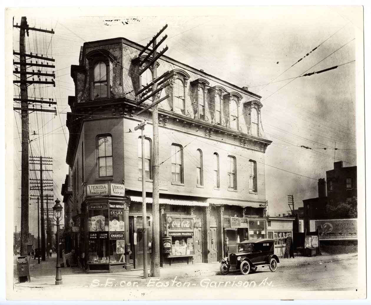 Garrison Pharmacy on the southeast corner of Easton and Garrison by Unknown