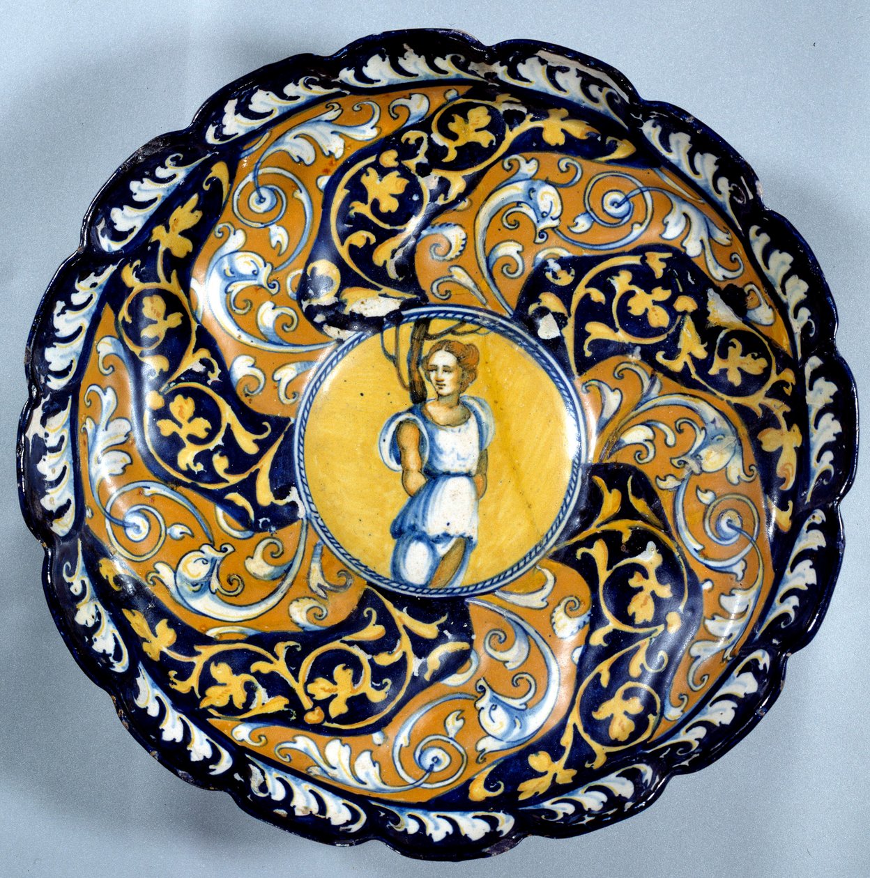 Godronnee Faience Cup Decorated with an Angel by Unknown artist
