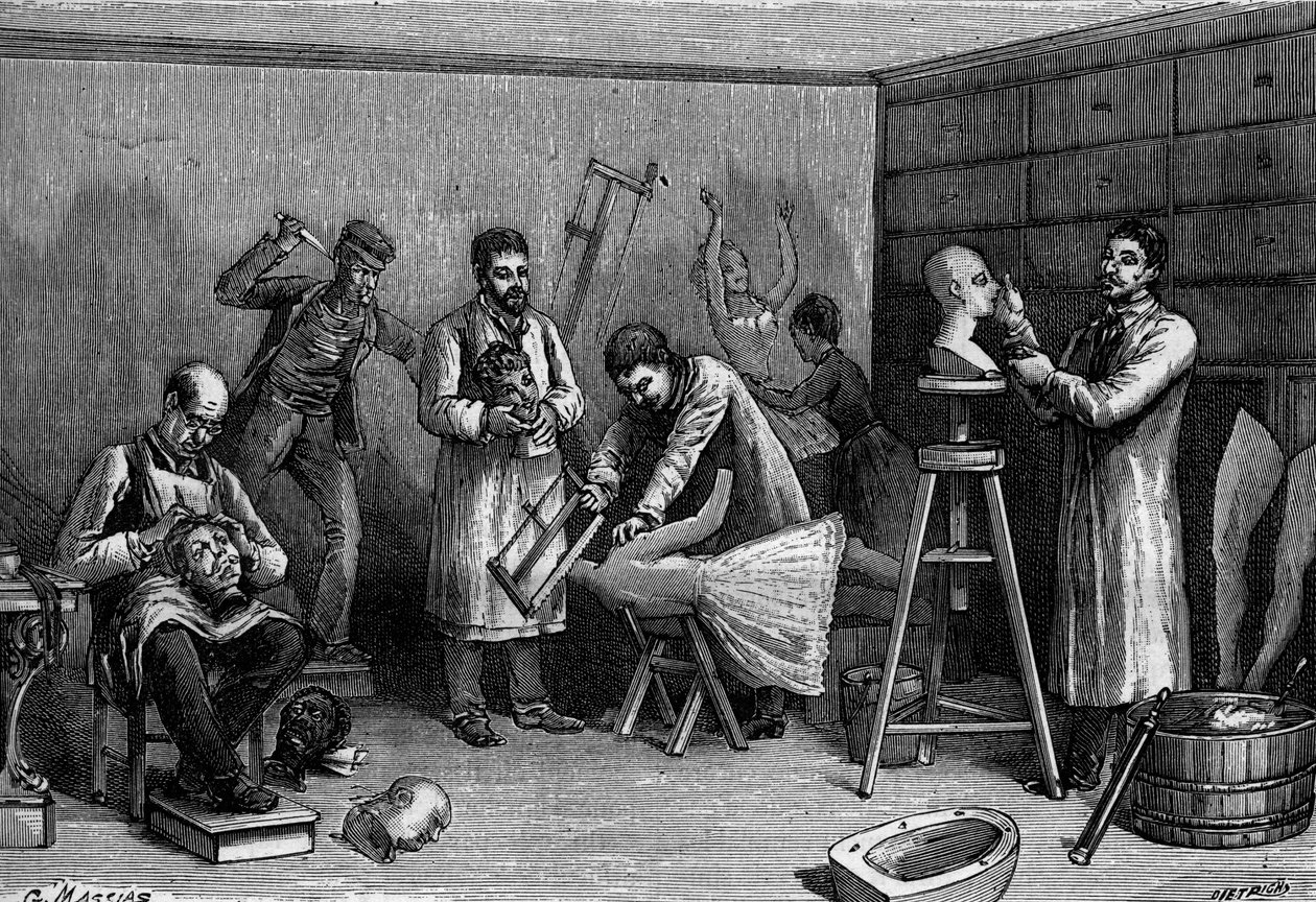 Making wax characters at the Musee Grevin, in Paris. Engraving in 
