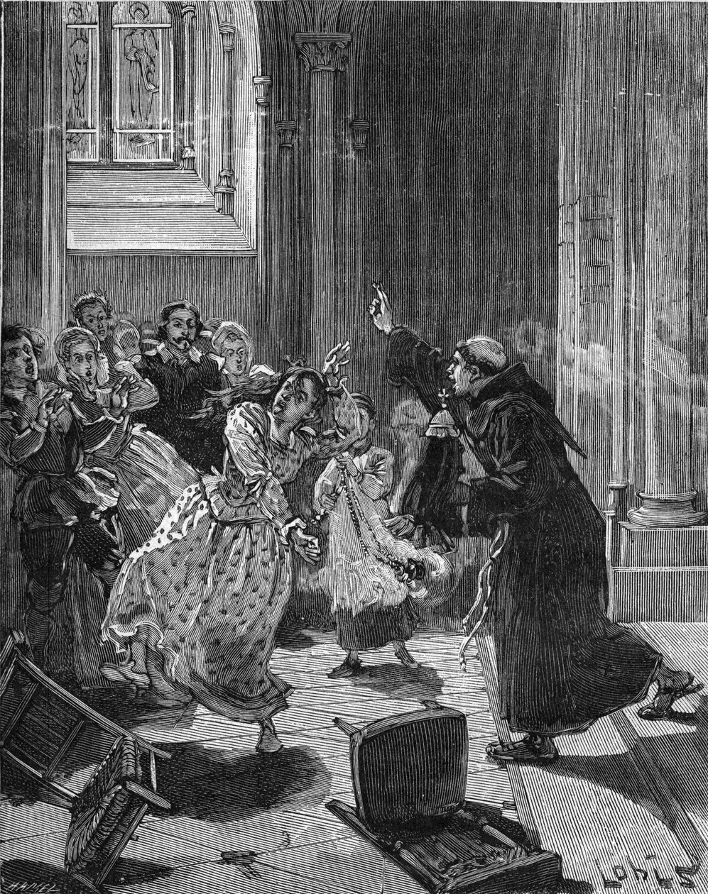 Paris, Church Sainte Genevieve (1599): a Capuchin monk trying to exorcise a woman, Martha, claiming to be possessed by the Devil. Engraving of the 19th century. In 