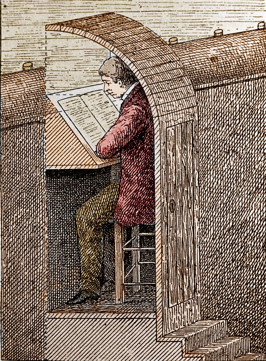 The blower in his hole. A theatre blower helps comedians remember their text when they