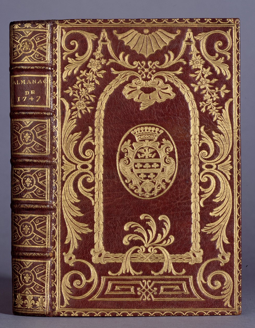 Book cover, binding with ornaments varies to the arms of the Cotte family of an almanac from 1747 by Unknown artist