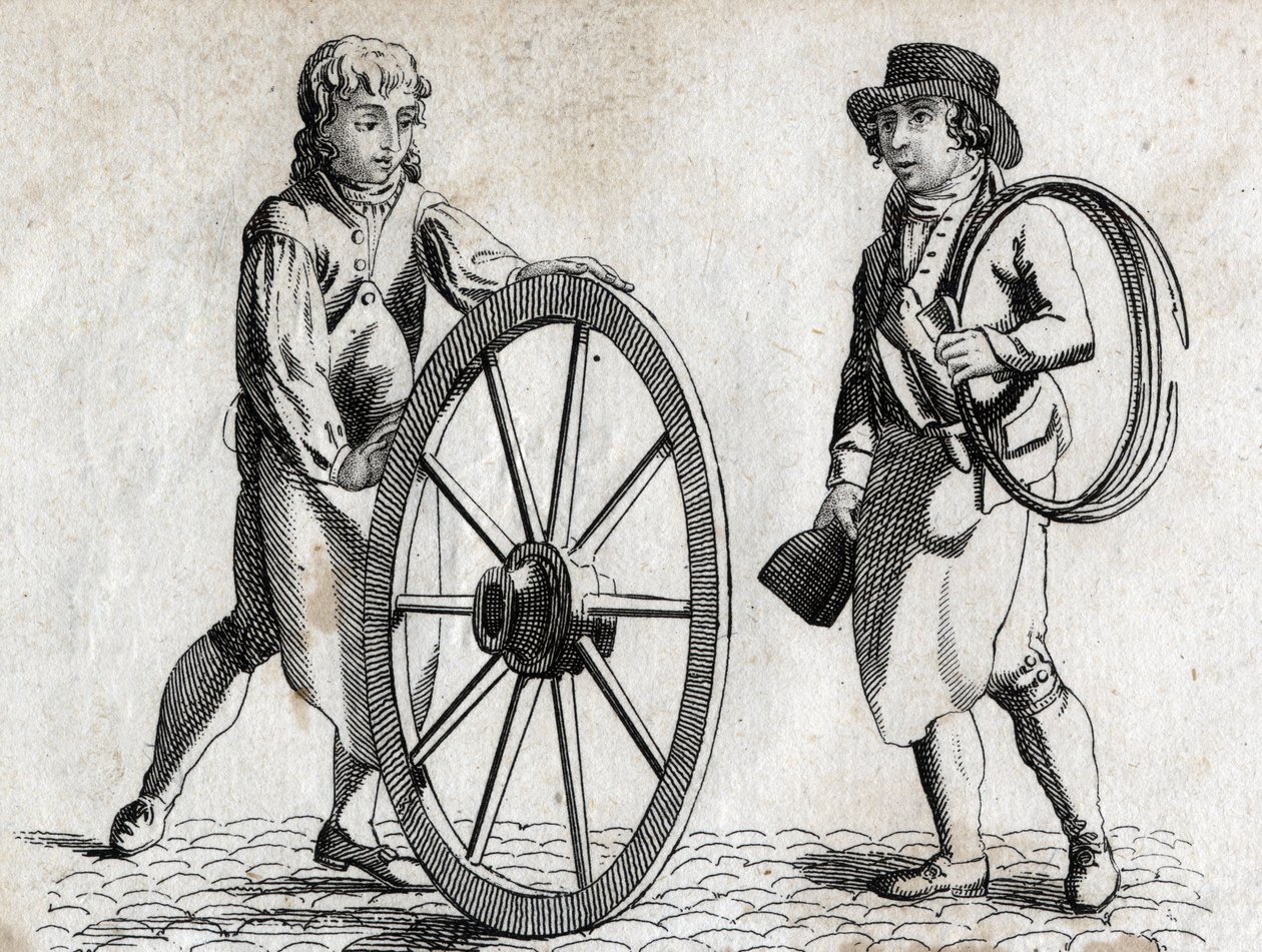 Charron with cart wheel and apprentice. Engraving late 18th century. by Unknown artist
