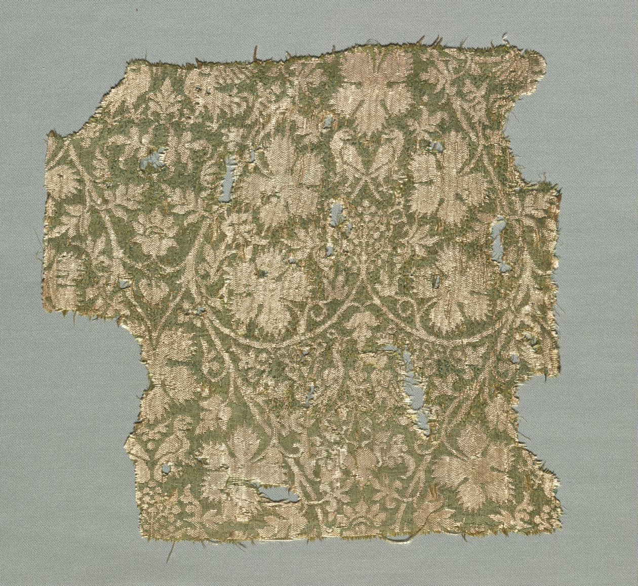 Silk fragment with scrolling vines, grape leaves, grapes and birds by Unknown artist