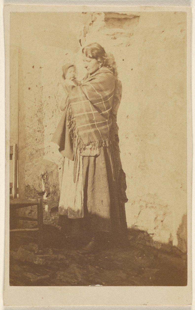 Unidentified woman wearing a shawl, holding a baby by Unknown artist/maker