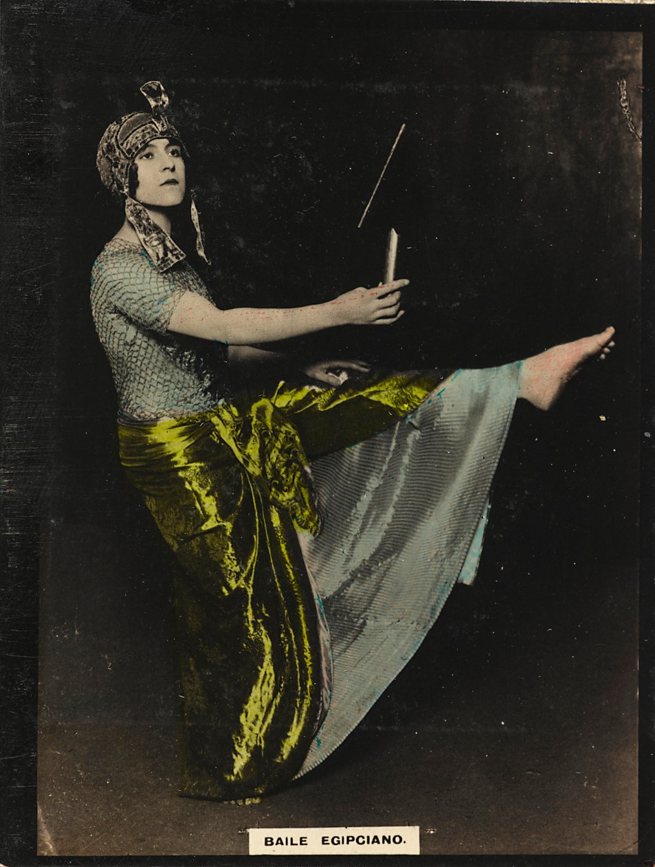 A young woman in oriental costumes performing an Egyptian dance by Unknown photographer