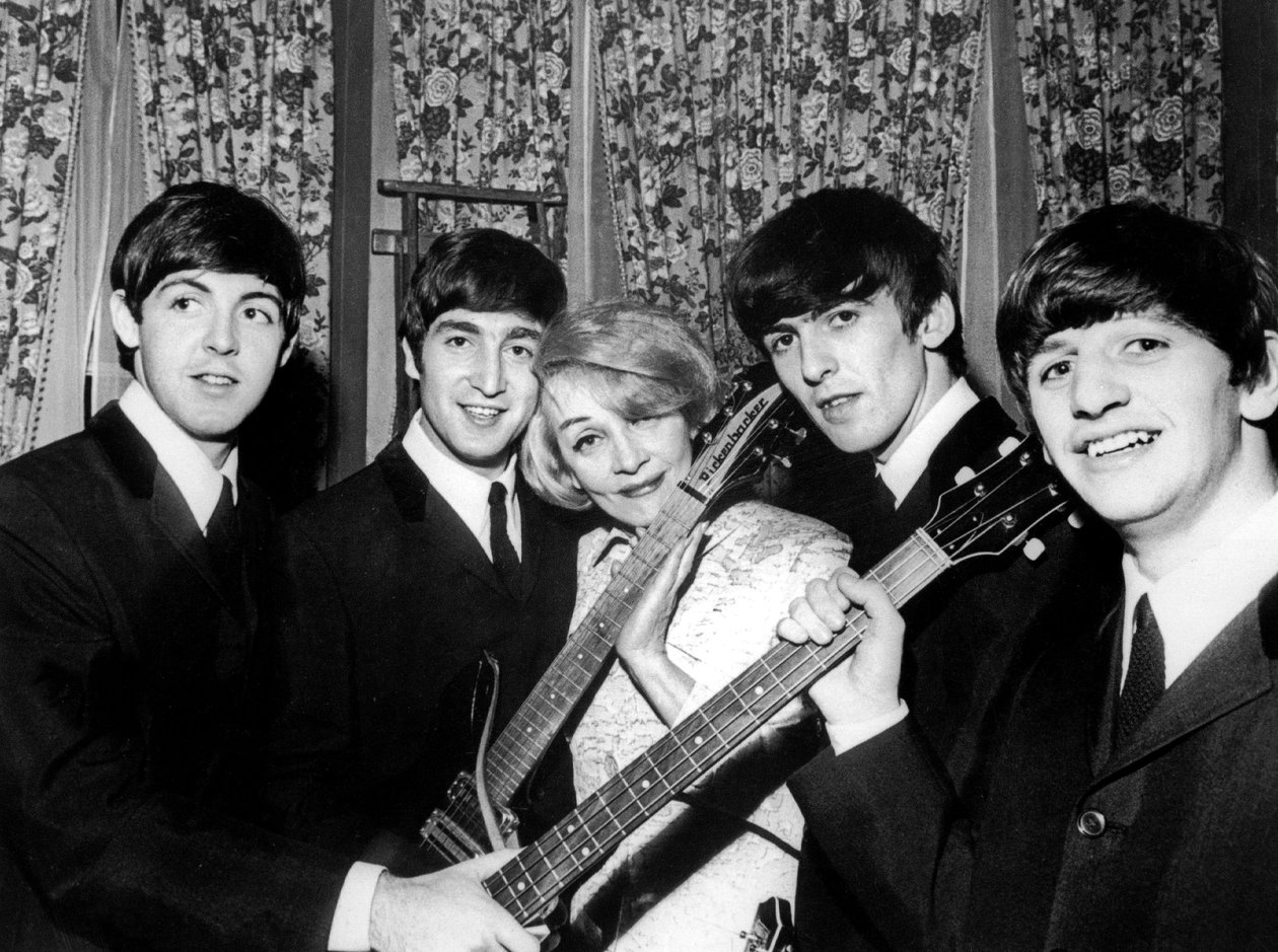 Marlene Dietrich with The Beatles: Paul McCartney, John Lennon, George Harrison, and Ringo Starr, November 1963 by Unknown photographer