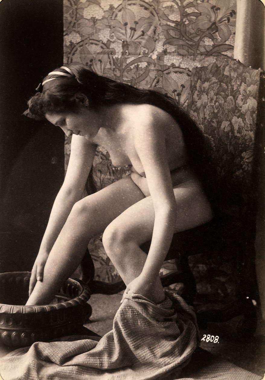 Portrait of a Nude Woman Washing Her Feet by Unknown photographer
