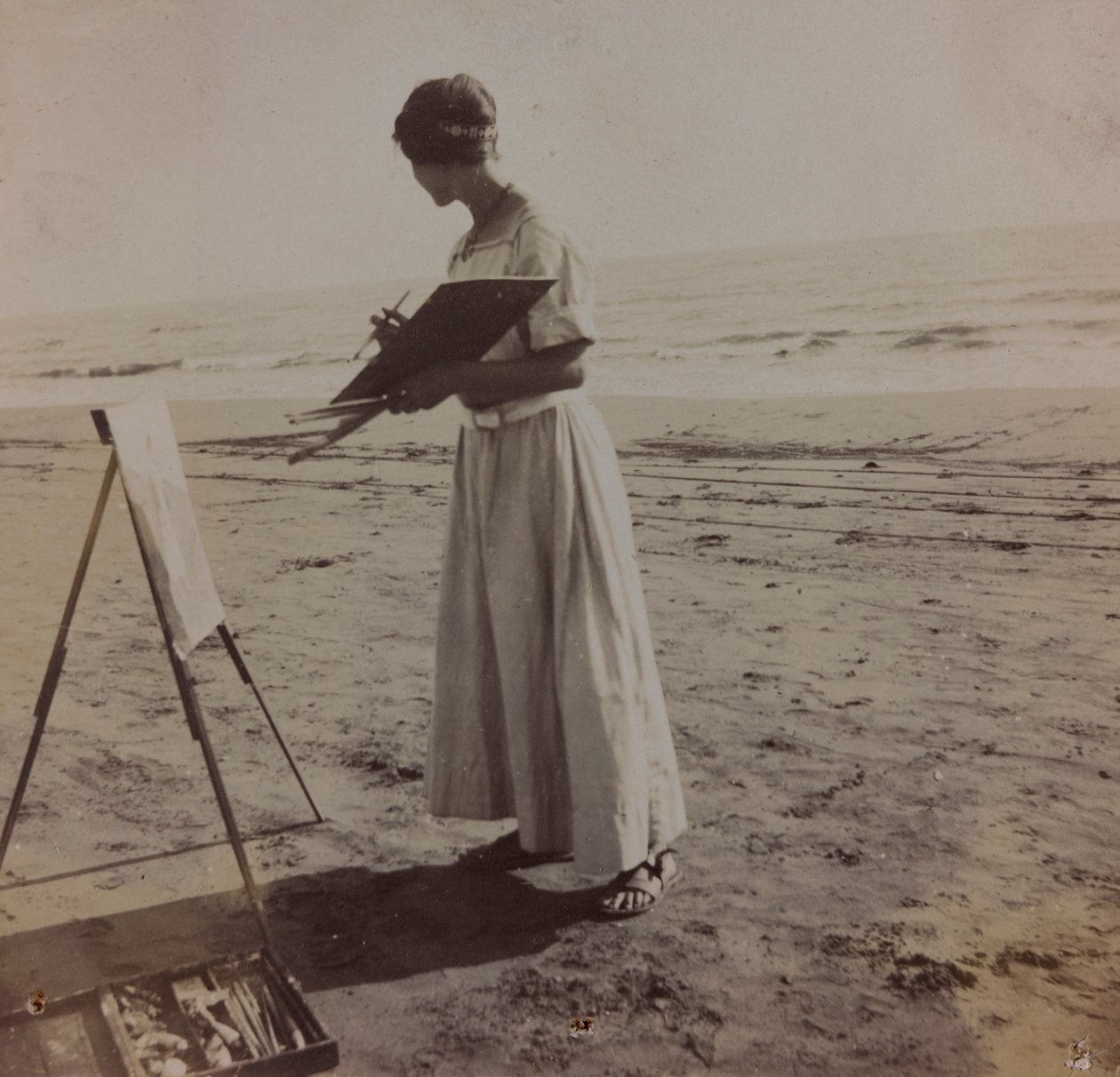Young Painter on the Beach in Forte dei Marmi, Italy by Unknown photographer