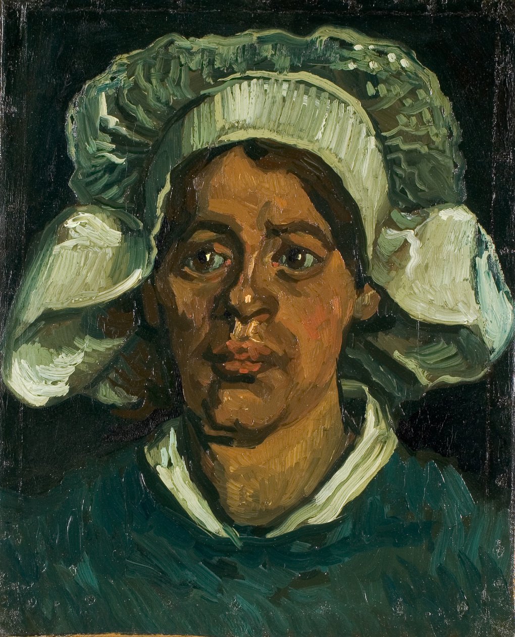 Head of a Peasant Woman Wearing a White Hood, 1884-1885 by Vincent van Gogh