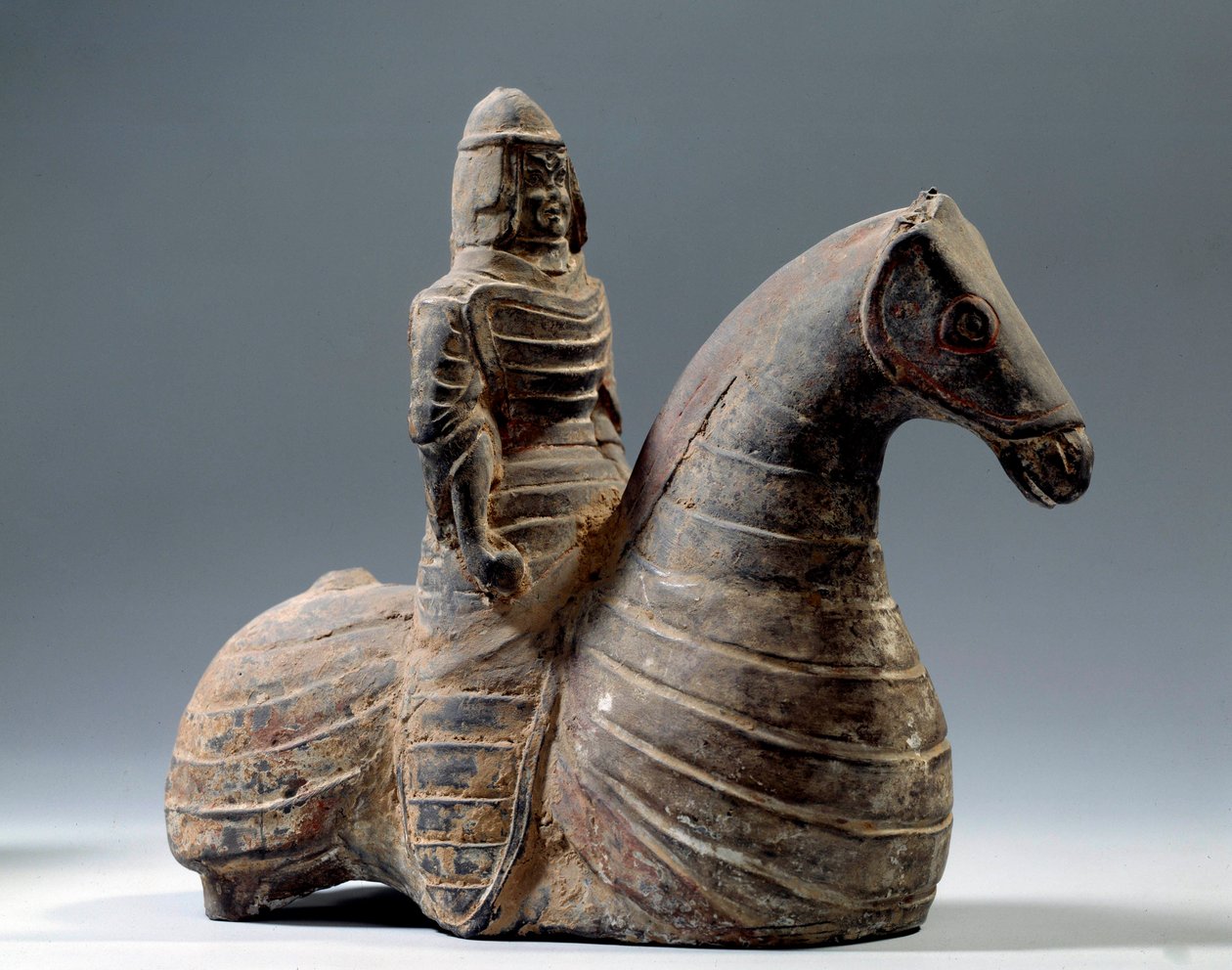 Chinese Art: Statuette of Horseman in Armor (206 BC-220 AD), Han Period. Paris, Musee Cernuschi by Western Han Dynasty Chinese School