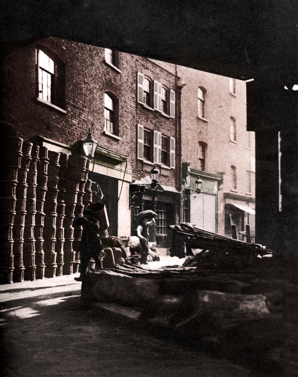 Fruit Baskets Piled Against Houses at Borough Market, London, 1926-1927 by Whiffin
